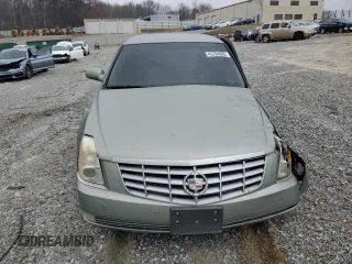 2006 Cadillac DTS 1SD z VIN 1G6KD57YX6U193025, wystawiony jako Copart lot #45784605 z przebiegiem Nie podano mil oraz Szkody całkowita. Historia ofert i sprzedaży dostępna na DreamBid. Obrazek 5.