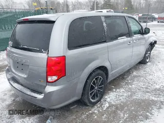 2018 Dodge Grand Caravan SE Plus with VIN 2C4RDGBG2JR254945, listed as a IAAI auction lot 41716809 with 99,404 mi miles and . Bid and sale history available at DreamBid. Image 4.