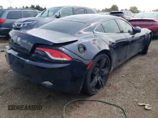 2012 Fisker Karma EcoChic z VIN YH4K16AA7CA000341, wystawiony jako Copart lot #62492854 z przebiegiem Nie podano mil oraz Szkody całkowita. Historia ofert i sprzedaży dostępna na DreamBid. Obrazek 3.