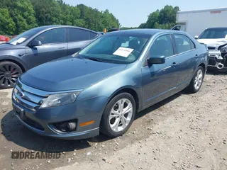 2012 Ford Fusion SE z VIN 3FAHP0HA4CR209490, wystawiony jako IAAI lot #42376506 z przebiegiem 145 622 mil mil oraz . Historia ofert i sprzedaży dostępna na DreamBid. Obrazek 18.