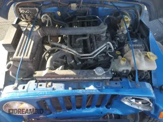 2003 Jeep Wrangler X z VIN 1J4FA39S33P320254, wystawiony jako Copart lot #52392525 z przebiegiem 206 325 mil mil oraz Szkoda całkowita • Salvage title. Historia ofert i sprzedaży dostępna na DreamBid. Obrazek 12.