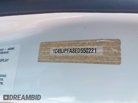 2014 Jeep Patriot Latitude with VIN 1C4NJPFA8ED550221, listed as a IAAI auction lot 41919419 with 185,386 mi miles and . Bid and sale history available at carsss.com. Image 9.