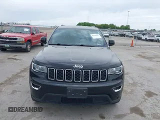 2018 Jeep Grand Cherokee Laredo E with VIN 1C4RJFAG6JC335606, listed as a IAAI auction lot 42280666 with 113,438 mi miles and . Bid and sale history available at DreamBid. Image 12.