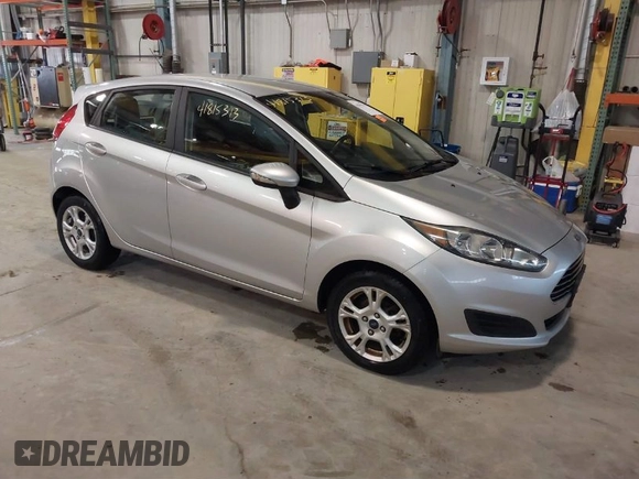 2016 Ford Fiesta SE with VIN 3FADP4EJ9GM197205, listed as a IAAI auction lot 41815313 with 115,689 mi miles. Bid and sale history available at carsss.com. Image 1.