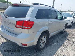 2014 Dodge Journey SXT z VIN 3C4PDCBB0ET133029, wystawiony jako IAAI lot #42434575 z przebiegiem 218 609 mil mil oraz . Historia ofert i sprzedaży dostępna na DreamBid. Obrazek 4.