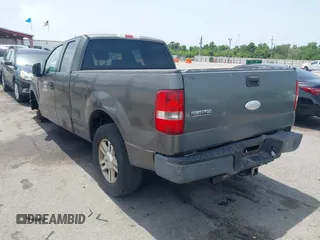 2007 Ford F-150 STX with VIN 1FTRX12W57NA70455, listed as a IAAI auction lot 42648613 with 295,961 mi miles and . Bid and sale history available at DreamBid. Image 3.