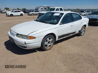 2004 Oldsmobile Alero GL1 z VIN 1G3NL52E24C192576, wystawiony jako IAAI lot #42279477 z przebiegiem 207 050 mil mil oraz . Historia ofert i sprzedaży dostępna na DreamBid. Obrazek 2.