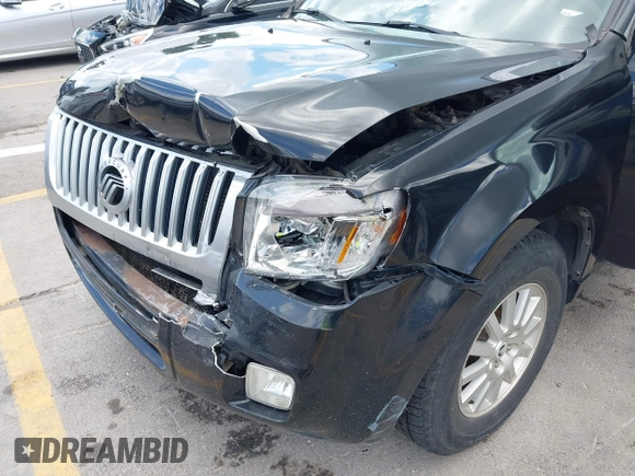 2011 Mercury Mariner Premier with VIN 4M2CN8HGXBKJ07489, listed as a IAAI auction lot 42574942 with 163,786 mi miles and . Bid and sale history available at DreamBid. Image 6.