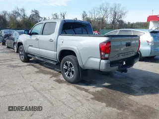 2018 Toyota Tacoma SR with VIN 3TMCZ5AN6JM170128, listed as a IAAI auction lot 42038979 with 59,497 mi miles. Bid and sale history available at carsss.com. Image 3.