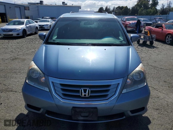 2010 Honda Odyssey EX-L with VIN 5FNRL3H75AB023925, listed as a Copart auction lot 51528745 with 134,982 mi miles and Salvage Title. Bid and sale history available at carsss.com. Image 5.