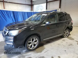 2017 Subaru Forester Touring with VIN JF2SJAWC8HH564037, listed as a Copart auction lot 87677265 with 114,986 mi miles and Salvage Title. Bid and sale history available at DreamBid. Image 1.