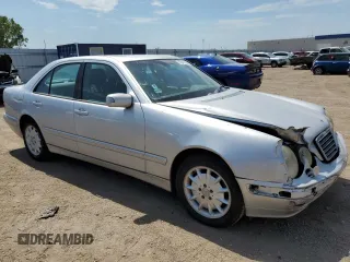 2002 Mercedes-Benz E-Class with VIN WDBJF82J92X065591, listed as a Copart auction lot 65841964 with 155,195 mi miles and Salvage Title. Bid and sale history available at carsss.com. Image 4.
