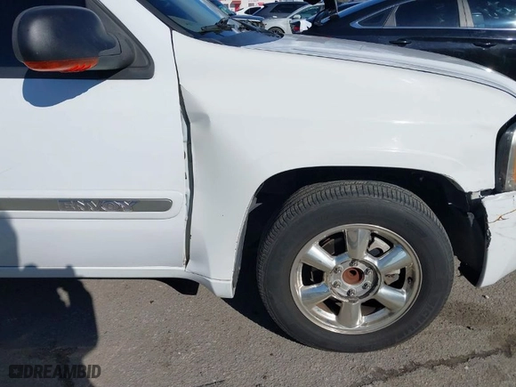 2002 GMC Envoy SLT with VIN 1GKDS13S522216498, listed as a IAAI auction lot 41642757 with 164,981 mi miles. Bid and sale history available at carsss.com. Image 6.