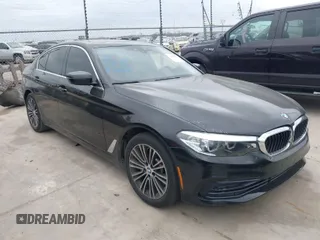 2019 BMW 5 Series 530i with VIN WBAJA5C50KWW38431, listed as a IAAI auction lot 41483263 with 94,436 mi miles. Bid and sale history available at carsss.com. Image 1.