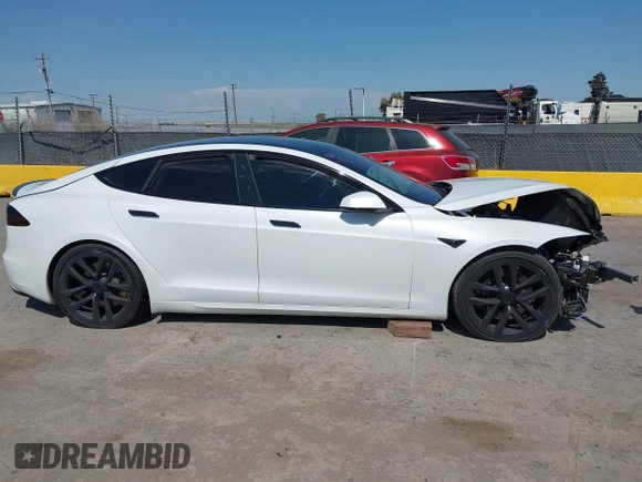 2023 Tesla Model S with VIN 5YJSA1E59PF500816, listed as a IAAI auction lot 42409049 with Not provided miles and . Bid and sale history available at DreamBid. Image 13.