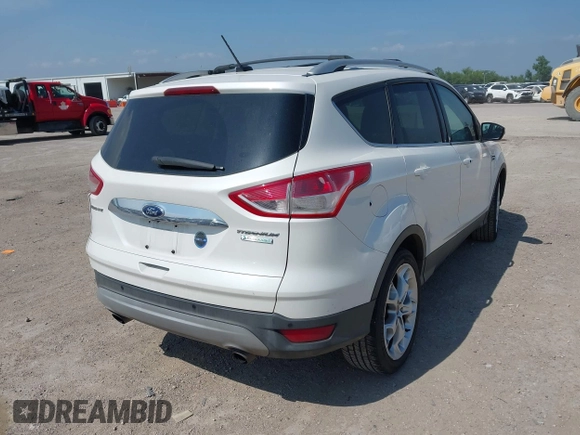 2015 Ford Escape Titanium with VIN 1FMCU0JX4FUB07322, listed as a IAAI auction lot 42220345 with 184,852 mi miles and . Bid and sale history available at DreamBid. Image 4.