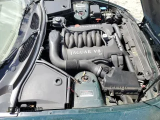 2002 Jaguar XK with VIN SAJDA42C22NA23724, listed as a Copart auction lot 53521005 with 61,468 mi miles and Salvage Title. Bid and sale history available at DreamBid. Image 11.
