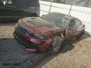 2022 Dodge Charger SRT Hellcat Redeye Widebody Jailbreak with VIN 2C3CDXL94NH102719, listed as a Copart auction lot 38883714 with 22,328 mi miles and Salvage Title. Bid and sale history available at carsss.com. Image 1.