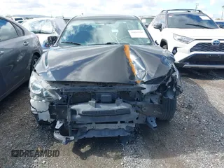 2016 Mazda 3 i Sport with VIN JM1BM1T77G1317385, listed as a IAAI auction lot 38893587 with 115,103 mi miles and . Bid and sale history available at DreamBid. Image 6.