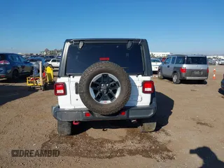 2019 Jeep Wrangler Unlimited Rubicon with VIN 1C4HJXFN7KW505383, listed as a IAAI auction lot 41220907 with 53,578 mi miles and . Bid and sale history available at DreamBid. Image 16.
