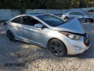 2014 Hyundai Elantra Coupe with VIN KMHDH6AH4EU026680, listed as a Copart auction lot 77350814 with 104,828 mi miles and Salvage Title. Bid and sale history available at carsss.com. Image 4.