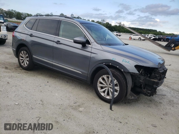 2018 Volkswagen Tiguan SEL with VIN 3VV3B7AX5JM125247, listed as a Copart auction lot 61404605 with 96,748 mi miles and Salvage title. Bid and sale history available at DreamBid. Image 4.