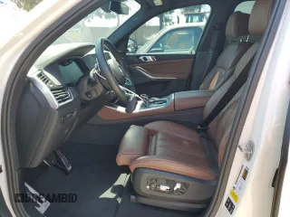 2019 BMW X5 xDrive40i with VIN 5UXCR6C57KLK85504, listed as a Copart auction lot 60908665 with 21,333 mi miles and Salvage title. Bid and sale history available at DreamBid. Image 7.