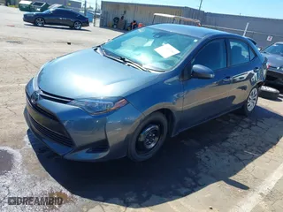 2019 Toyota Corolla L with VIN 5YFBURHE2KP877728, listed as a IAAI auction lot 41862006 with 82,660 mi miles. Bid and sale history available at carsss.com. Image 18.
