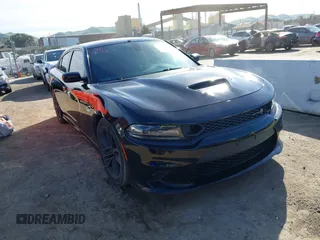 2019 Dodge Charger Scat Pack z VIN 2C3CDXGJ9KH756602, wystawiony jako IAAI lot #41654488 z przebiegiem 126 844 mil mil oraz . Historia ofert i sprzedaży dostępna na DreamBid. Obrazek 1.