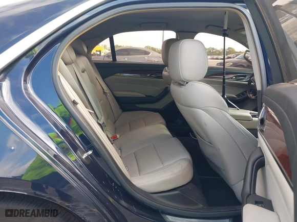 2016 Cadillac CTS Sedan RWD with VIN 1G6AP5SX8G0119984, listed as a IAAI auction lot 42098257 with 98,593 mi miles. Bid and sale history available at carsss.com. Image 8.