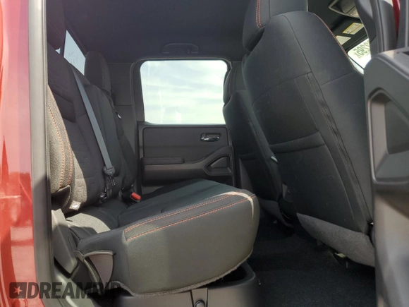 2022 Nissan Frontier Pro-4X with VIN 1N6ED1EK1NN601886, listed as a Copart auction lot 65182295 with 51,879 mi miles and Salvage title. Bid and sale history available at DreamBid. Image 10.