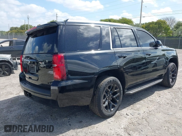 2017 Chevrolet Tahoe LS with VIN 1GNSCAKC1HR225698, listed as a IAAI auction lot 42044712 with 89,605 mi miles and . Bid and sale history available at DreamBid. Image 4.