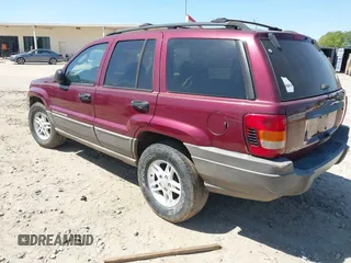 2003 Jeep Grand Cherokee Laredo with VIN 1J4GX48S93C523831, listed as a IAAI auction lot 41852442 with 270,735 mi miles. Bid and sale history available at carsss.com. Image 3.