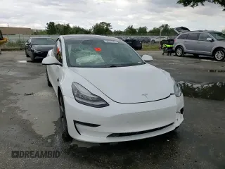 2021 Tesla Model 3 Standard Range Plus z VIN 5YJ3E1EA2MF859832, wystawiony jako Copart lot #56743865 z przebiegiem 77 025 mil mil oraz Nie do naprawy. Historia ofert i sprzedaży dostępna na DreamBid. Obrazek 13.