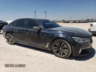 2018 BMW 7 Series M760i xDrive with VIN WBA7H6C51JG614580, listed as a Copart auction lot 65748304 with 46,801 mi miles and Clean Title. Bid and sale history available at carsss.com. Image 4.