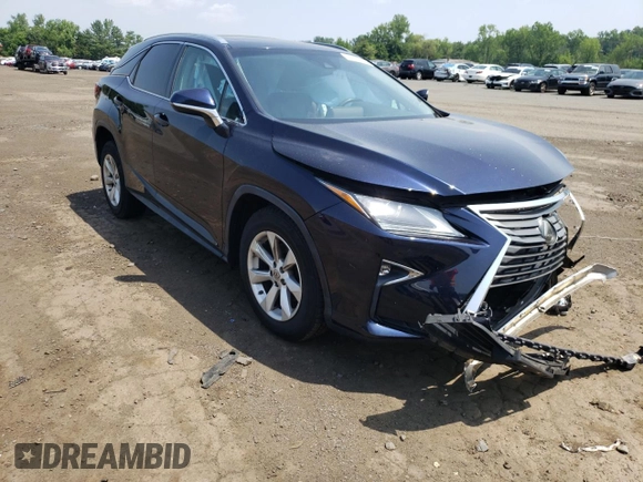 2017 Lexus RX 350 with VIN 2T2BZMCA3HC092809, listed as a Copart auction lot 61770475 with 106,732 mi miles and Salvage title. Bid and sale history available at DreamBid. Image 4.