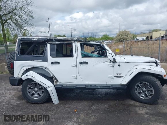 2016 Jeep Wrangler Unlimited Sahara with VIN 1C4BJWEG8GL129577, listed as a IAAI auction lot 42184373 with 185,761 mi miles and . Bid and sale history available at DreamBid. Image 12.