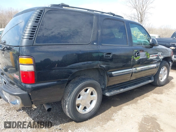 2005 GMC Yukon SLT with VIN 1GKEK13TX5R274020, listed as a IAAI auction lot 41889445 with 209,132 mi miles. Bid and sale history available at carsss.com. Image 6.