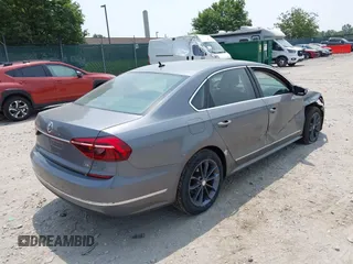 2017 Volkswagen Passat S with VIN 1VWAT7A39HC052893, listed as a IAAI auction lot 42415313 with 91,299 mi miles and . Bid and sale history available at DreamBid. Image 4.