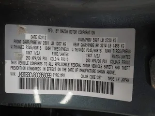 2012 Mazda CX-9 Touring z VIN JM3TB3CV8C0358099, wystawiony jako IAAI lot #41478110 z przebiegiem 151 716 mil mil oraz . Historia ofert i sprzedaży dostępna na DreamBid. Obrazek 9.