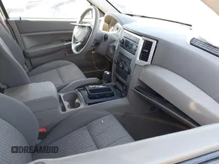 2008 Jeep Grand Cherokee Laredo with VIN 1J8GR48K28C169859, listed as a IAAI auction lot 41965149 with 166,069 mi miles. Bid and sale history available at carsss.com. Image 5.