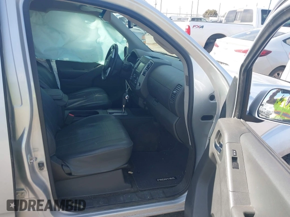 2018 Nissan Frontier SV with VIN 1N6AD0EV0JN761092, listed as a IAAI auction lot 41502701 with 103,900 mi miles and . Bid and sale history available at DreamBid. Image 5.