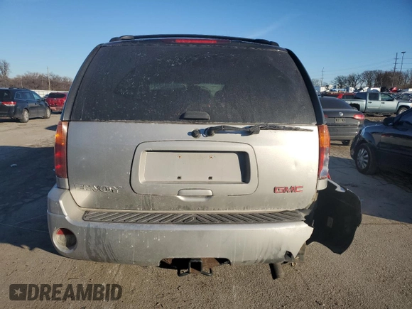 2005 GMC Envoy SLT with VIN 1GKDT13SX52276648, listed as a Copart auction lot 42944265 with 211,633 mi miles and Clean Title. Bid and sale history available at carsss.com. Image 6.