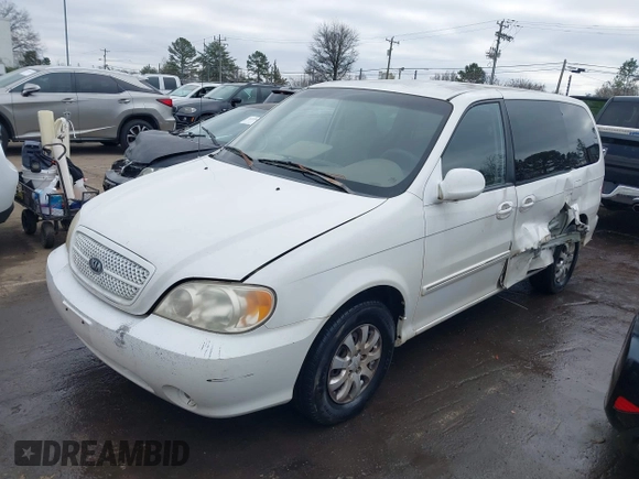2004 Kia Sedona LX with VIN KNDUP131446537660, listed as a IAAI auction lot 41526183 with 282,891 mi miles. Bid and sale history available at carsss.com. Image 17.