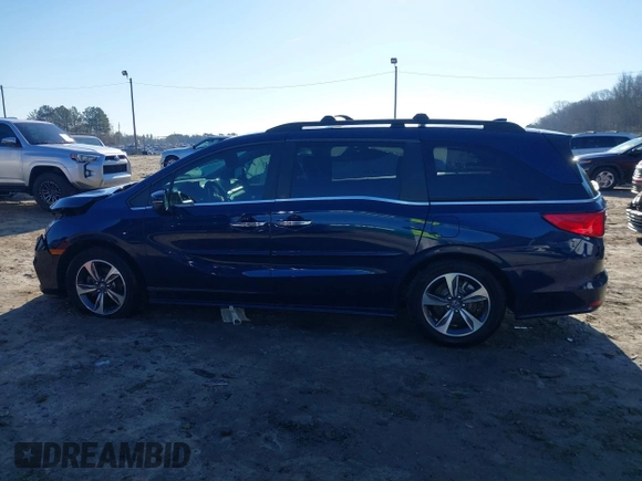 2020 Honda Odyssey Touring with VIN 5FNRL6H89LB015744, listed as a IAAI auction lot 41495735 with 106,440 mi miles and . Bid and sale history available at DreamBid. Image 14.