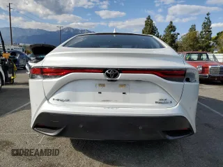2023 Toyota Mirai XLE with VIN JTDAAAAA4PA009853, listed as a Copart auction lot 51687695 with 27,638 mi miles and Salvage Title. Bid and sale history available at DreamBid. Image 6.