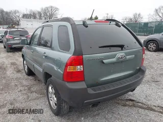 2005 Kia Sportage LX with VIN KNDJF723957038800, listed as a IAAI auction lot 41497596 with 122,189 mi miles and . Bid and sale history available at carsss.com. Image 6.