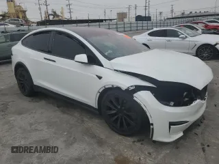 2023 Tesla Model X with VIN 7SAXCBE53PF380665, listed as a Copart auction lot 50799755 with Not Provided miles and Salvage Title. Bid and sale history available at DreamBid. Image 4.