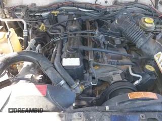 1997 Jeep Cherokee SE with VIN 1J4FJ28S7VL553270, listed as a IAAI auction lot 41825524 with 157,015 mi miles. Bid and sale history available at carsss.com. Image 10.