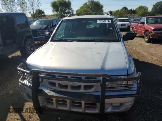 2001 Isuzu Rodeo S with VIN 4S2CK58W914301037, listed as a Copart auction lot 72153074 with 230,781 mi miles and Clean Title. Bid and sale history available at DreamBid. Image 5.